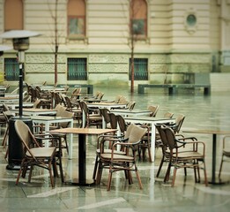 Street cafe tables on a rainy autumn day 