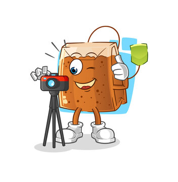 tea bag photographer character. cartoon mascot vector