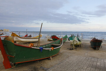 Artisanal fishing canoes on the beach
