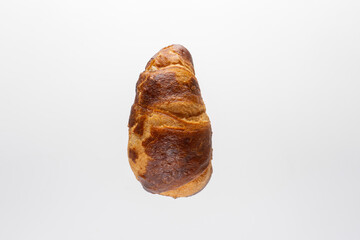 Naklejka premium Curved Croissant, Pastry side view