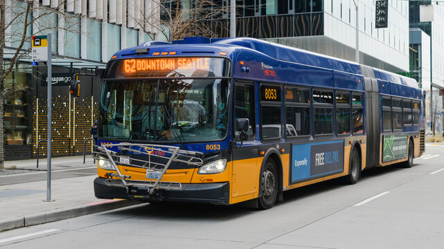 Seattle - January 23, 2022; King County Metro articulated bus in downtown Seattle with a bike rack attached