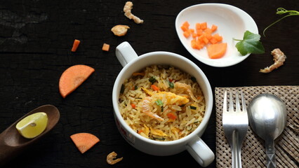  fried rice on wooden background	
