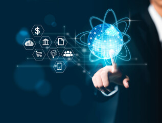 A business man touches a screen like a globe with his finger. globe concept with network threads surrounded with internet of things icons.Business communications, finance, banking and global networkin