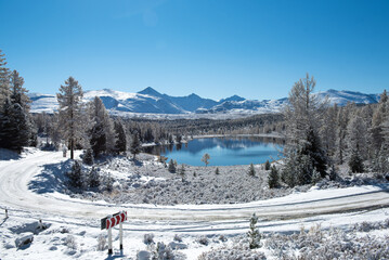 Lake in the mountains. Winter. Mountain landscape. Lake Kidel. Altai.