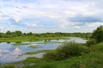 A small beautiful house on the background of a bright sky on a sunny day