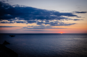 Fototapeta na wymiar Sunset on the sea in Cornwall, United Kingdom