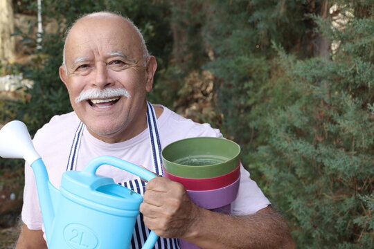 Senior man enjoying gardening outdoors