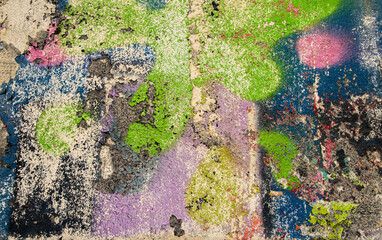 Colored stains of old paint on a concrete surface. Colored paints. Painted surface. Concrete wall....