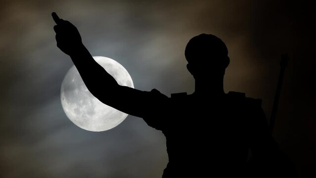 Julius Caesar: Time Lapse by Night with Full Moon and Dark Silhouette of Roman Emperor Monument