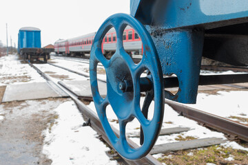 Blue wheel of an industrial wagon