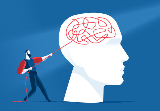 Uomo tira un filo che si &egrave; intrecciato nel cervello umano