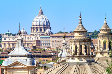 Obraz premium Landscape from Pincio Hill on roofs and churches of the ancient city of Rome. Far away St. Peter's Basilica.