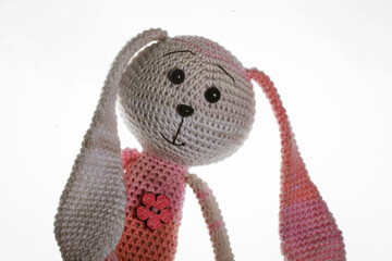 hand-knitted toy pink and white bunny 