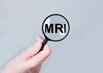MRI word through magnifying lens.