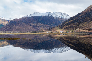 Sunny view of the beautiful lake, reflection on Causeway