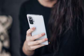woman using holding smart phone for shopping online at home. Social network, shopping concept
