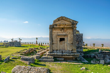 The necropolis of Hierapolis is filled with sarcophagi, rock tombs, was an ancient Greek city located on hot springs in classical Phrygia in Anatolia and currently comprise an archaeological museum.