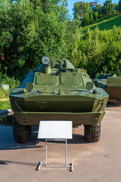 Combat reconnaissance landing vehicle. BRDM 2 in the Victory Park in Nizhny Novgorod, exhibited as an exhibit surrounded by green trees. High quality photo
