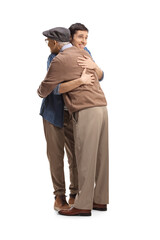 Happy young man hugging an elderly man