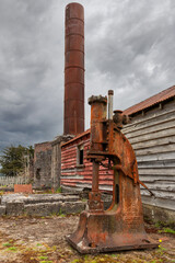 Plakat Old mining factory in the ghost town of Waiuta, New Zealand