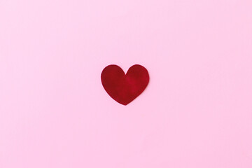 Happy Valentine's Day! Stylish valentine heart flat lay on pink background. Valentines day card template. Cute red velvet heart on pink paper. Love concept