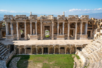 Naklejka premium The roman theater is located in the middle of Hierapolis and is very well preserved. it was built during the reign of Emperor Hadrian in 2nd century AD. and had a capacity of 8500–10000 spectators.