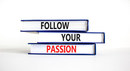 Follow your passion symbol. Concept words Follow your passion on books on beautiful white table white background. Business, motivation and follow your passion concept. Copy space.