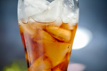  Ice cubes in cola beverage