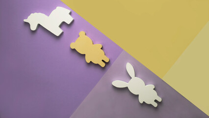 wooden toys on colorful minimalist background