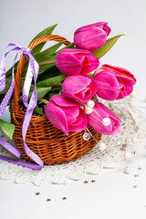 Still life with colorful tulips on white