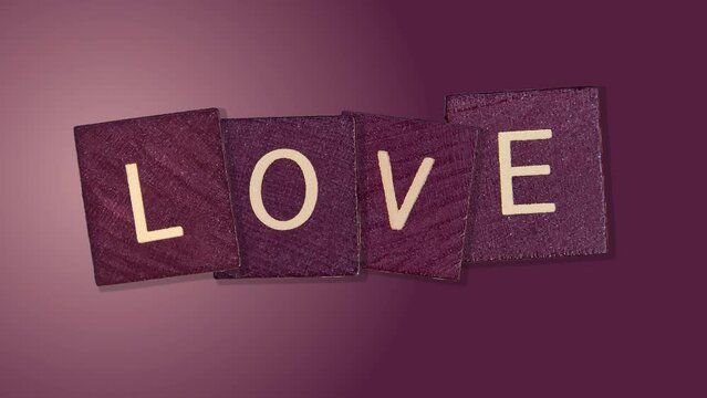 LOVE Word on Natural wood cubes - Animated Love Lettering on trending purple color gradient animated background. template for Date, Wedding, 8 March, Womens. 4k - Valentine's Day girls gift.