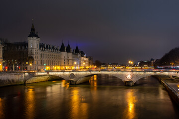 Fototapeta na wymiar Night Paris, Pont au Change, reflection of lights in the river Seine, cityscape