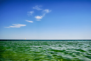 Obraz premium Calm on the Pacific Ocean in Australia on the beach in Chelsea, Victoria.