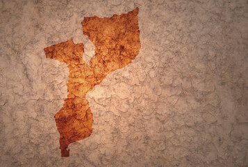 map of mozambique on a old vintage crack paper background