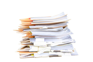 Manila folders stacked overflowing an in box at an office on a white background