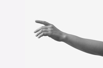 A hand trying to touch or reach out someone or something on white background. Minimal black and white arm concept. Hand gesture.