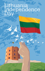 Hand with the national flag Lithuania on the background of the Gediminas Tower. Happy Independence Day.
