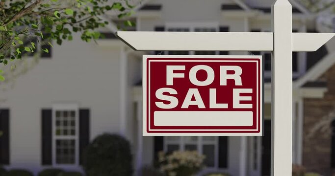 4k Pan and Zoom of For Sale Real Estate Sign in Front of New House.