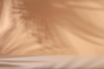 Minimal abstract background for cosmetic products presentation.Empty premium podium with shadows of...