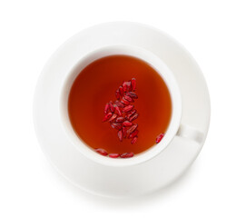 Cup of tea with dried barberries on white background
