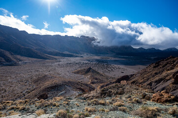 Visiting Teide national park on Tenerife and view on volcanic landscapes, Canary islands, Spain