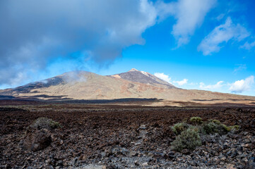 Visiting Teide national park on Tenerife and view on volcanic landscapes, Canary islands, Spain