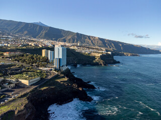 Aerial view on colorful houses and top of mount Teide in Puerto de la Cruz, Tenerife, Canary islands at sunrise