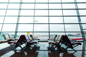 Empty airport terminal, there are no  passanger waiting in lounge