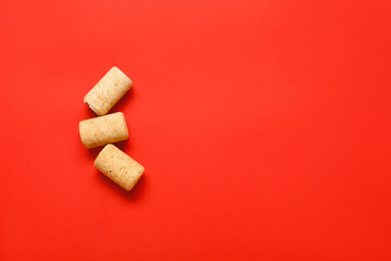 Wine corks on red background