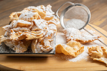 Bugie and riccioline a Traditional sweet crisp pastry for italian carnival, angel wings