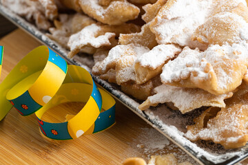 Bugie and riccioline a Traditional sweet crisp pastry for italian carnival, angel wings