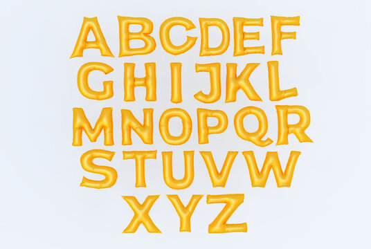 3d render of golden ballons alphabet fonts isolated on white background. golden font set