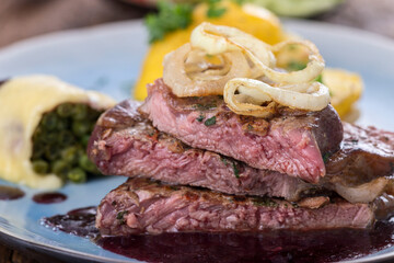 steak with roasted onions