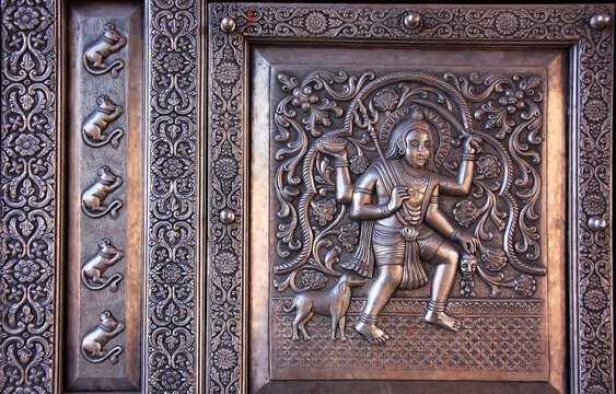 DESHNOK, INDIA - FEBRUARY 21: Detail of decoration on a door of Karni Mata Temple on February 21, 2011 in Deshnok, India. Over 20000 holy rats live in Karni Mata Temple.